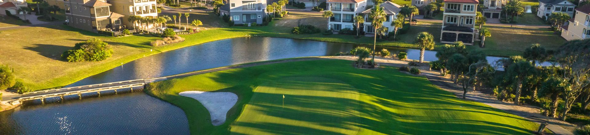 Immerse yourself in the coastal elegance of the Nicklaus Ocean Golf Course at Hammock Beach Golf Resort & Spa. This captivating image showcases this premier golfing destination's meticulously designed fairways and stunning coastal landscapes.