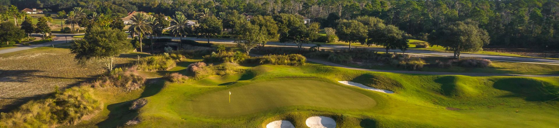 Explore the scenic beauty of the Watson Conservatory Golf Course at Hammock Beach Resort. This captivating image captures the essence of a premier golfing destination, featuring meticulously designed fairways against the backdrop of Hammock Beach's natural splendour.