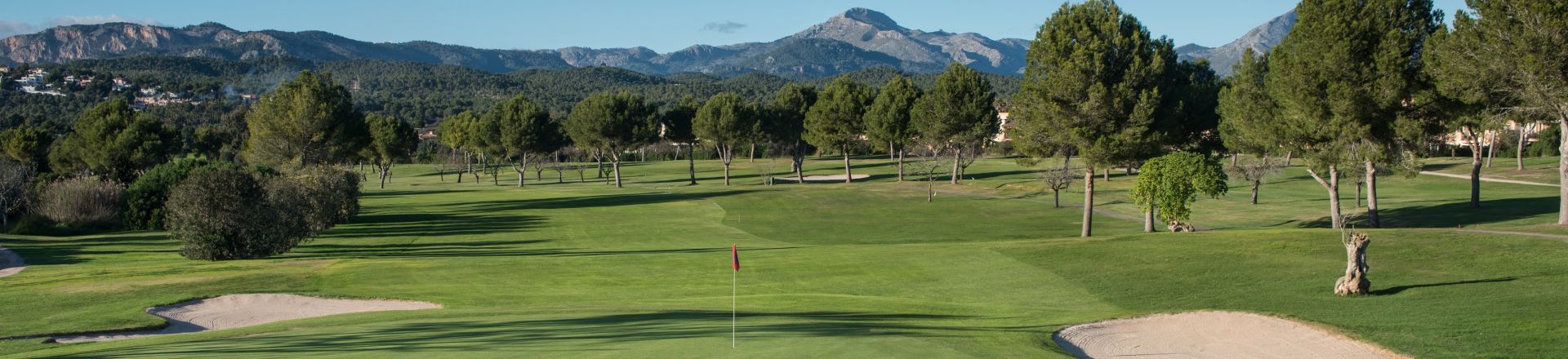 Embark on a golfing adventure at Golf Santa Ponsa I. This captivating image captures the essence of a premier golfing destination in Mallorca, Spain, featuring meticulously designed fairways against the backdrop of lush Mediterranean landscapes.